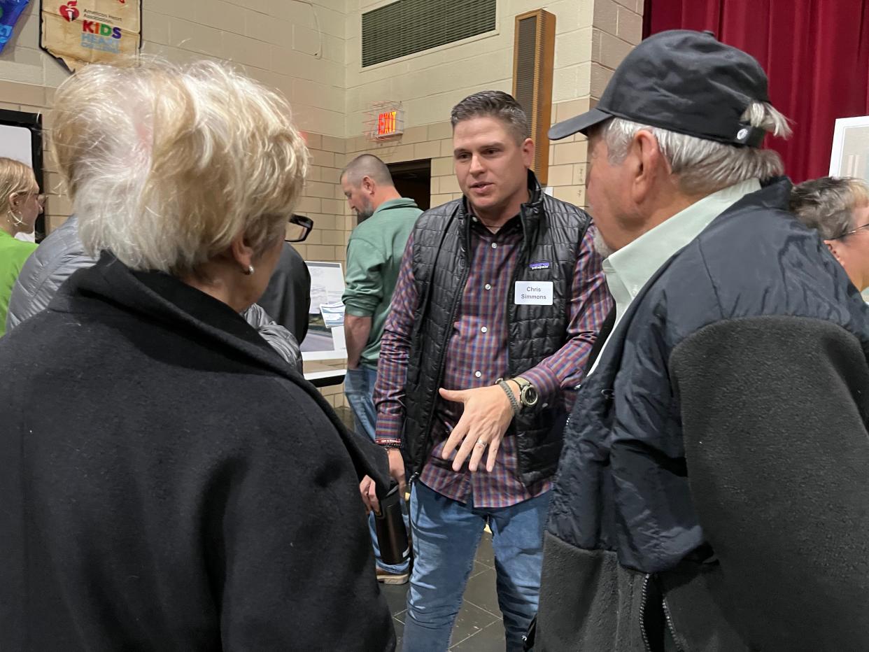 Chris Simmons, a development manager for Samsung C&T, answers questions Wednesday at Washington Elementary School during a public meeting about a proposed solar farm in Washington Township.