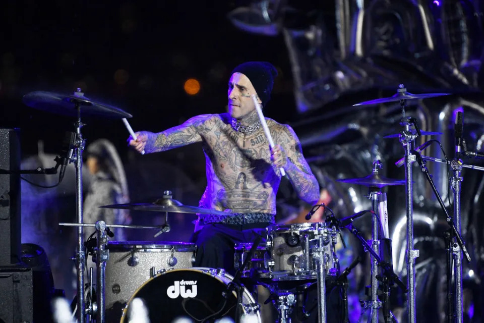 Travis Barker at the Tommy Hilfiger Spring 2023 ready to wear fashion show and event at Skyline Drive-In on September 11, 2022 in Brooklyn, New York. (Photo by Giovanni Giannoni/WWD via Getty Images)