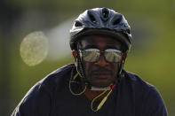 Bike lanes are reflected in the sunglasses of a cyclist as he peddles over the Frederick Douglass Memorial Bridge in Washington, Monday, May 8, 2023. A Rutgers-Virginia Tech study of cycling in more than a dozen cities in North America and Europe finds that many new bikeways were built during the height of COVID-19. And these efforts were rewarded with increased cycling in places that undertook robust development. (AP Photo/Carolyn Kaster)