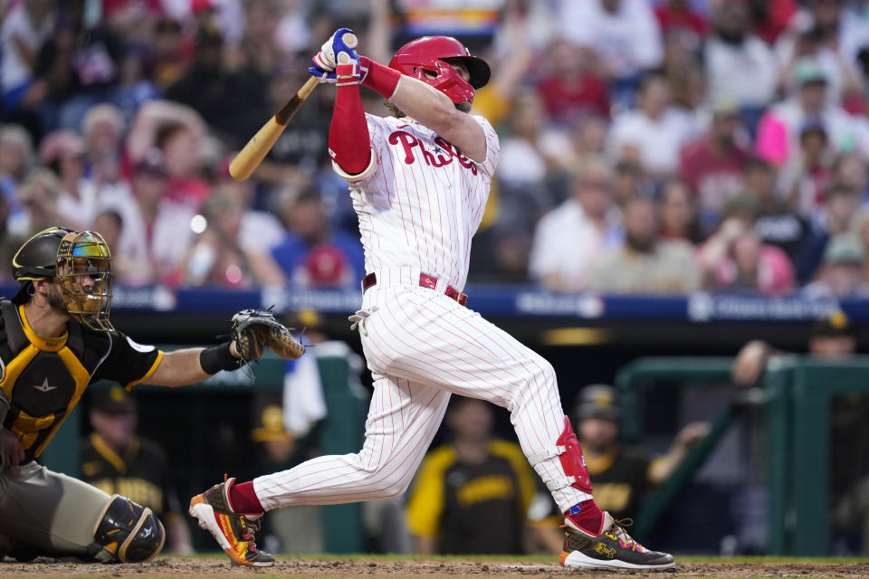 Philadelphia Phillies' Bryce Harper hits a home run against San Diego Padres pitcher Ryan Weathers during the fourth inning of the second baseball game in a doubleheader, Saturday, July 15, 2023, in Philadelphia. (AP Photo/Matt Slocum)