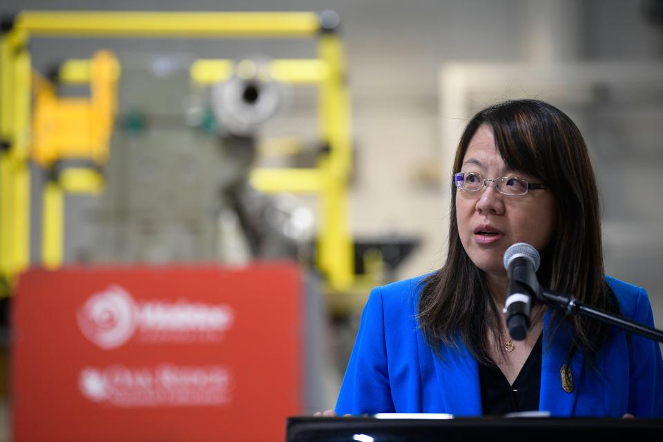 Xin Sun, Associate Laboratory Director for Energy Science and Technology Directorate at ORNL, speaks at Oak Ridge National Laboratory's National Transportation Research Center, 2360 Cherahala Blvd., in Hardin Valley, Tenn., on Wednesday, Nov. 9, 2022. ORNL, Argonne National Laboratory and Wabtec Corporation unveiled a single cylinder, dual-fuel locomotive engine powered by hydrogen designed to help decarbonize the rail industry throughout North America.