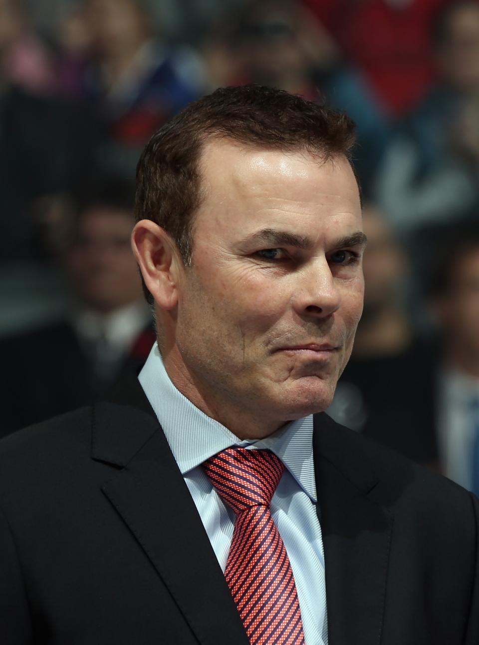 TORONTO, ON - NOVEMBER 11: Adam Oates is presented with his Hall of Fame jacket prior to the Hockey Hall of Fame Legends Game at the Air Canada Centre on November 11, 2012 in Toronto, Canada. Oates will be inducted into the Hockey Hall of Fame at a ceremony at the Hall on November 12. (Photo by Bruce Bennett/Getty Images)