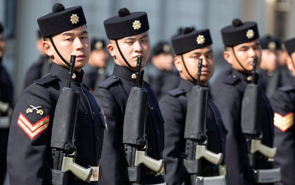 DT News The Queen's Own Gurkha Logistic Regiment today were judged to see if they're fit to mount The Queen's Guard at Buckingham Palace and carry out ceremonial guard duties at all the Royal Palaces this month. The soldiers who are normally based in Aldershot have been practising their ceremonial drill for months to be good enough for the prestigious public role which is normally undertaken by the Foot Guards Regiments of the Household Division. But the final decision rests on judges from the Household Division at Wellington Barracks who assessed the unit's drill, commands, dress, and military knowledge in a rigorous parade at this morning. The judges include the Brigade Major of the Household Division, Lieutenant Colonel Guy Stone, and the Garrison Sergeant Major Andrew Stokes. London 1 May 2019