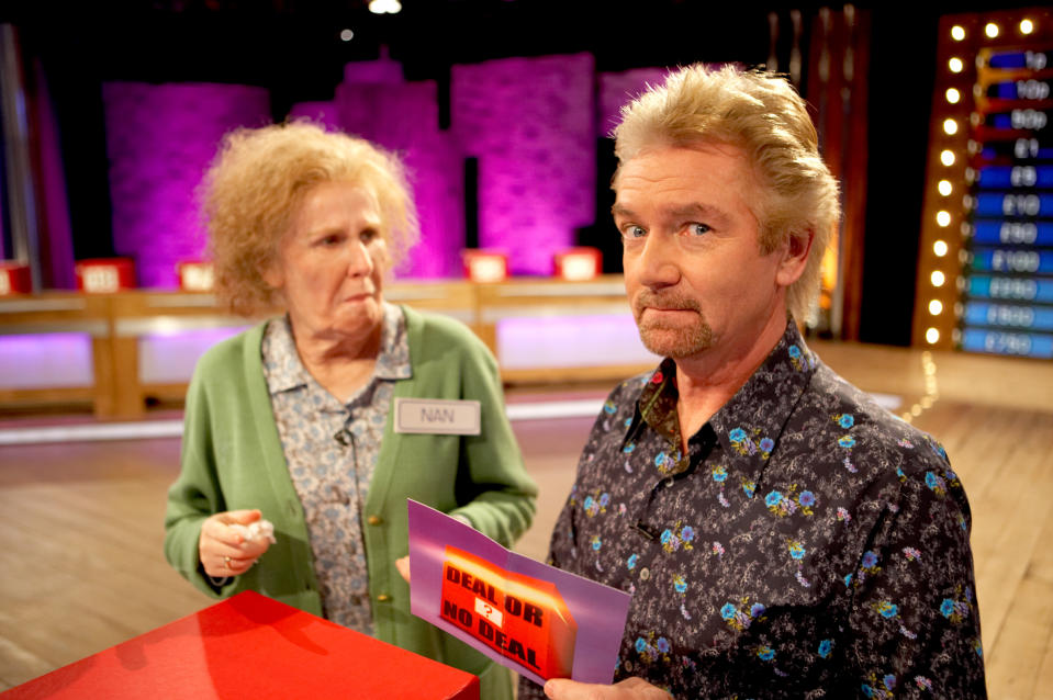 LONDON - MARCH 16:  Catherine Tate and Noel Edmonds take part in a special episode of Deal or No Deal for Red Nose Day on March 16, 2007. (Photo by Paul Groom/Comic Relief/Getty Images)