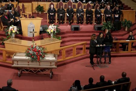 Randolph Holder's fiancee Maryiane Muhammad (C) speaks inside the Greater Allen A.M.E. Cathedral of New York during the funeral service for the slain New York City Police (NYPD) officer in the Queens borough of New York City, October 28, 2015. REUTERS/Mary Altaffer/Pool