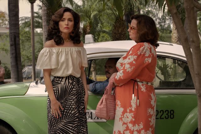 <p>Paul Sarkis/Apple TV+</p> (L-R) Rose Byrne is pictured as Sheila Rubin and Dierdre Friel as Greta Hauser in the Apple TV+ dramedy 'Physical'.