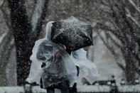 <p>Pedestrians walk through Central Park during a snowstorm in New York City, March 7, 2018. (Photo: Lucas Jackson/Reuters) </p>