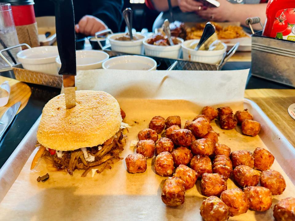 The S'mokin King, a pulled pork sandwich with sweet pepper slaw, was served with plenty of sweet potato tots.