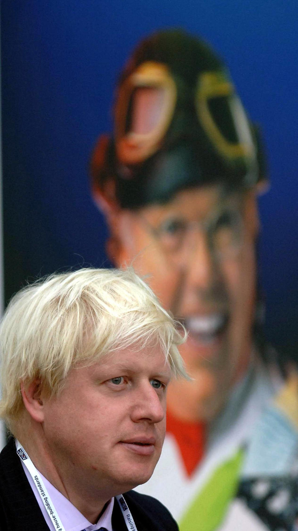 Boris Johnson the Conservative MP for Henley in front of a poster for Pier Comedian Roy Chubby Brown in Blackpool, Monday 3 October 2005 on the first day of the Conservative Conference. Colourful Tory MP Boris Johnson today said he found the idea that Gordon Brown could defeat any leader of the Conservative Party in a General Election "absolutely unbelievable". The member for Henley and Spectator editor, who is backing David Cameron's leadership bid, said that he was not in favour of would-be leaders trying to mimic Tony Blair but called for a new approach to Conservatism. Speaking at a conference fringe meeting, he predicted success for the Tories next time the country goes to polls. He said: "I think the Tories are going to win the next election. See PA Story TORY Boris. PRESS ASSOCIATION Photo. Photo credit should read: PA.