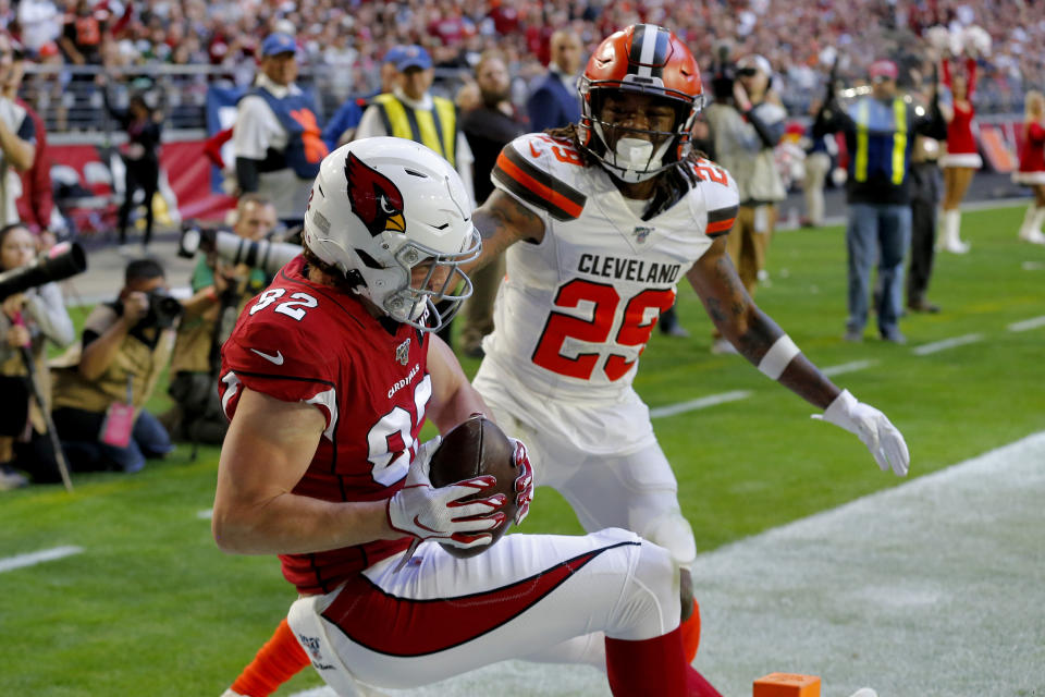 Arizona Cardinals tight end Charles Clay (85) pulls in a touchdown catch as Cleveland Browns defensive back Sheldrick Redwine (29) defends during the first half of an NFL football game, Sunday, Dec. 15, 2019, in Glendale, Ariz. (AP Photo/Rick Scuteri)