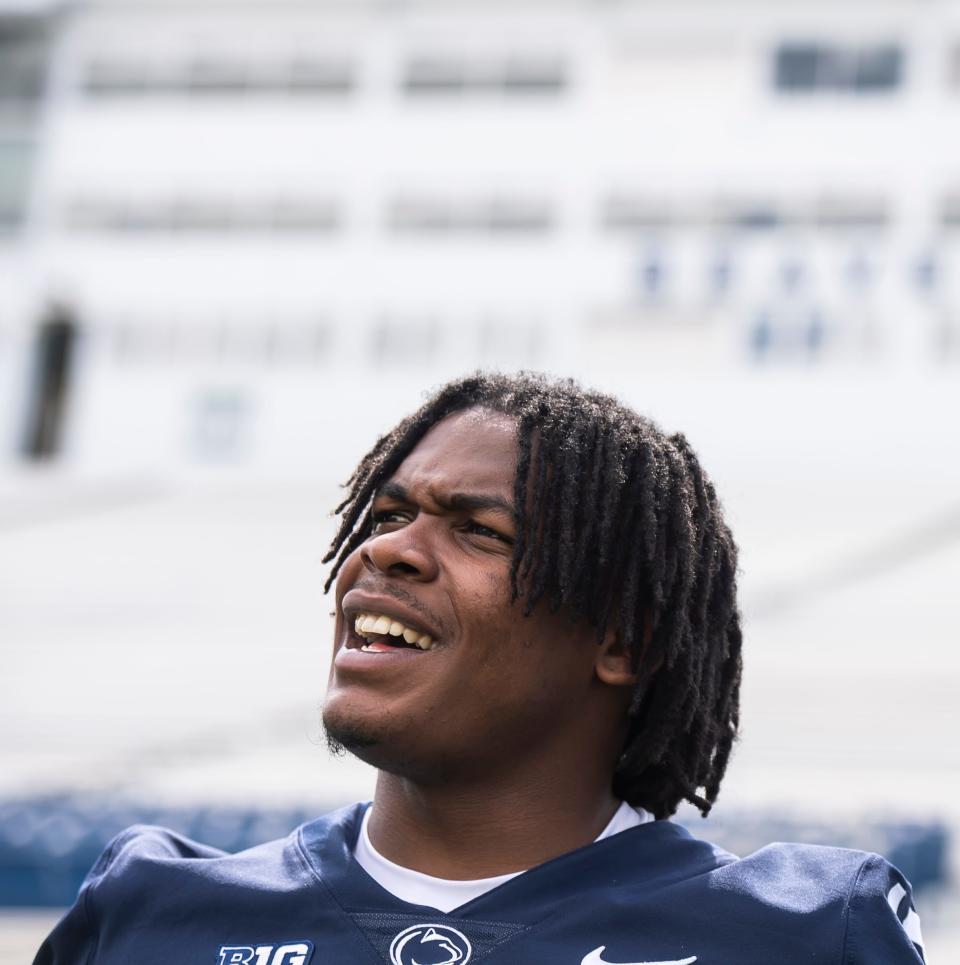 Penn State safety Ji'Ayir Brown smiles as he answers a question about the first week of training camp during football media day at Beaver Stadium.
