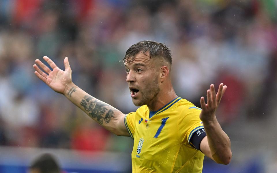 Ukraine captain Andriy Yarmolenko shows his displeasure.