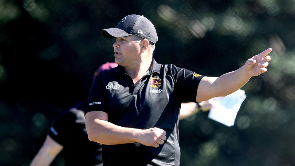 Anthony Seibold can be seen here instructing players at Broncos training.