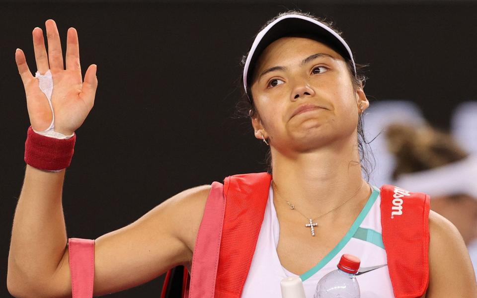 Britain's Emma Raducanu waves after losing to Montenegro's Danka Kovinic - AFP