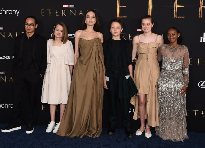 Maddox Jolie-Pitt, Vivienne Jolie-Pitt, Angelina Jolie, Knox Jolie-Pitt, Shiloh Jolie-Pitt, and Zahara Jolie-Pitt at the ‘Eternals’ premiere - Credit: Jordan Strauss/Invision/AP.