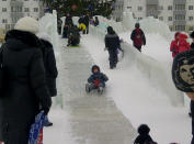 Outside the rink there are a number of large ice sculptures. They've even made a large slide for kids out ice. (Sunaya Sapurji)