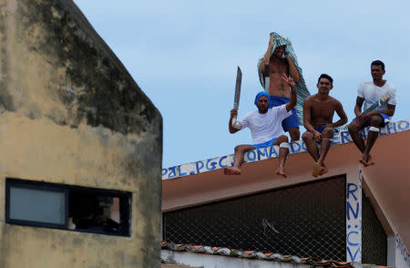 FILE PHOTO - Inmates are seen during an uprising at Alcacuz prison in Natal, Rio Grande do Norte state, Brazil January 20, 2017. REUTERS/Nacho Doce/File photo