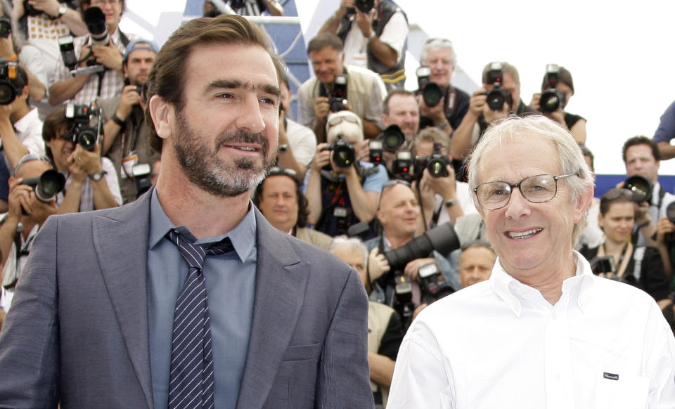 French soccer legend Eric Cantona,, left,and British Director Ken Loach  attend a photo call for their film "Looking For Eric<" during the 62nd International film festival in Cannes, southern France, Monday, May 18, 2009. (AP Photo/Joel Ryan)