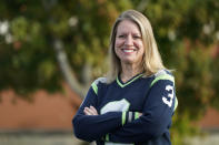 Mindi Wirth, who heads a group called Parents for Safe Schools that is seeking to overturn a sex education requirement for public schools, poses for a photo Sunday, Sept. 27, 2020, in Lynnwood, Wash. Democrats in the famously liberal state say they want to protect young people from sexual abuse, diseases and infections. But the increasingly outnumbered and aggrieved Republicans have taken issue with the content of the standards as they rally for local control. The resulting referendum on the November ballot marks the first time in the country that such a decision on sex ed will be decided by voters. (AP Photo/Elaine Thompson)