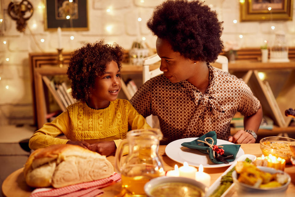 Many parents says it's important that kids feel included at holiday meals. (Photo: Getty Images)