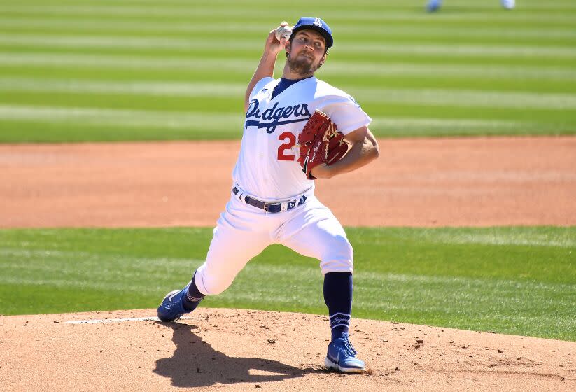 GLENDALE, ARIZONA MARCH 1, 2021-Dodgers pitcher Trevor Bauer throws.