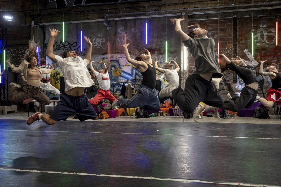 Dancers from the Olympic Games opening ceremony perform during a rehearsal Friday, June 7, 2024 in Saint-Denis, near Paris. The troupe of dancers for the historic opening ceremony of the Paris 2024 Olympics—the first to be held outside a stadium—are putting the finishing touches on a high-octane performance that will combine urban, contemporary, classic, and break dancing, complete with stomps, shouts, and body rolls. (AP Photo/Aurelien Morissard)