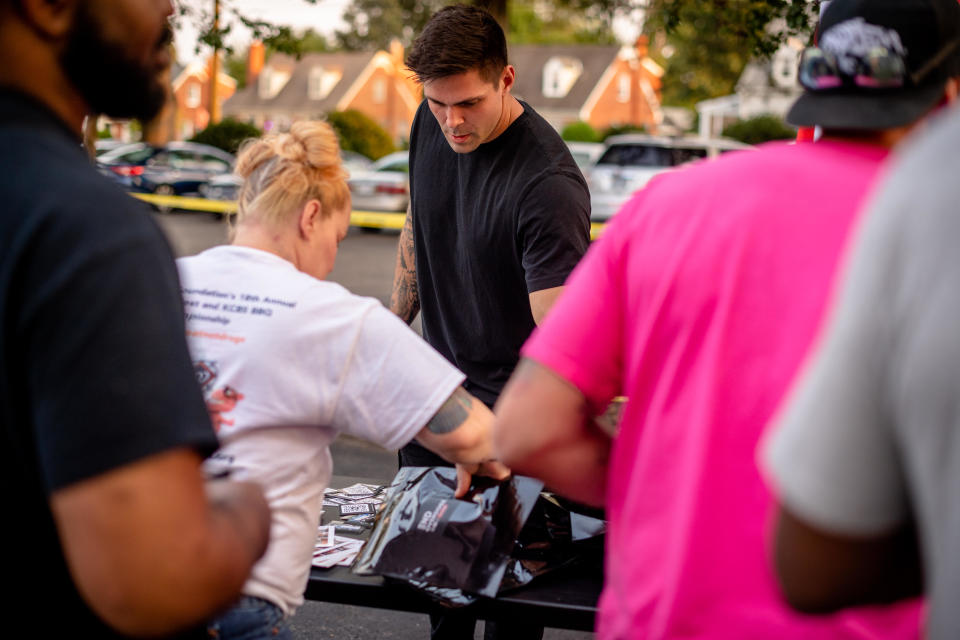 Mobilize Recovery volunteers distribute naloxone and overdose response kits at a service event during their summer 2022 bus tour stop in Richmond, VA. / Credit: Hilary Swift for Mobilize Recovery
