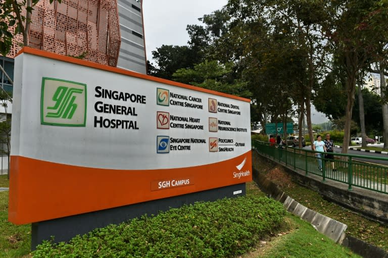 The state-run Singapore General Hospital said 678 patients as well as 273 medical workers were being contacted to be screened for the virus