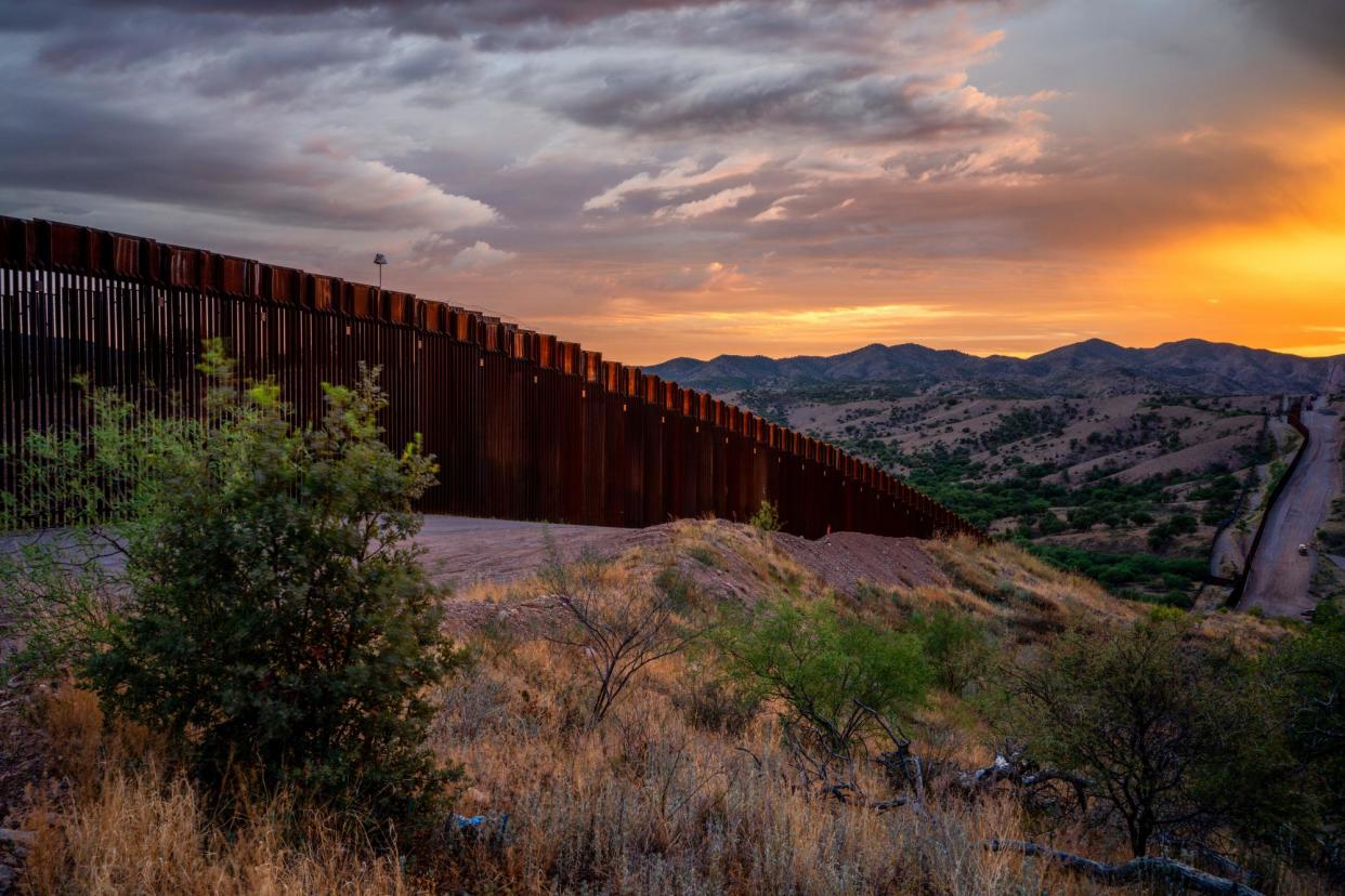 <span>The border fence between the US and Mexico in Nogales, Arizona, on 24 June 2024.</span><span>Photograph: Brandon Bell/Getty Images</span>