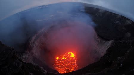 Kilauea volcano's summit lava lake shows a significant drop of roughly 220 metres below the crater rim in this wide angle camera view showing the entire north portion of the Overlook crater in Hawaii, U.S. May 6, 2018. USGS/Handout via REUTERS