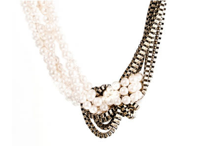 A shadow of Chanel, a lashing of Lanvin informs this pearl-and-chain combination to loop around your neck...