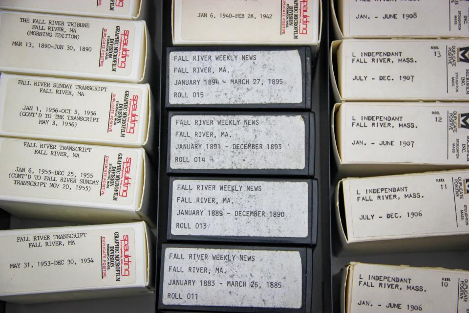 Boxes of microfilm containing archives of old Fall River newspapers are filed in the public library's reference room.