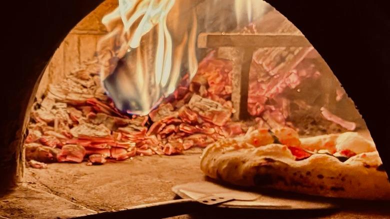 Pizza in wood-fired oven