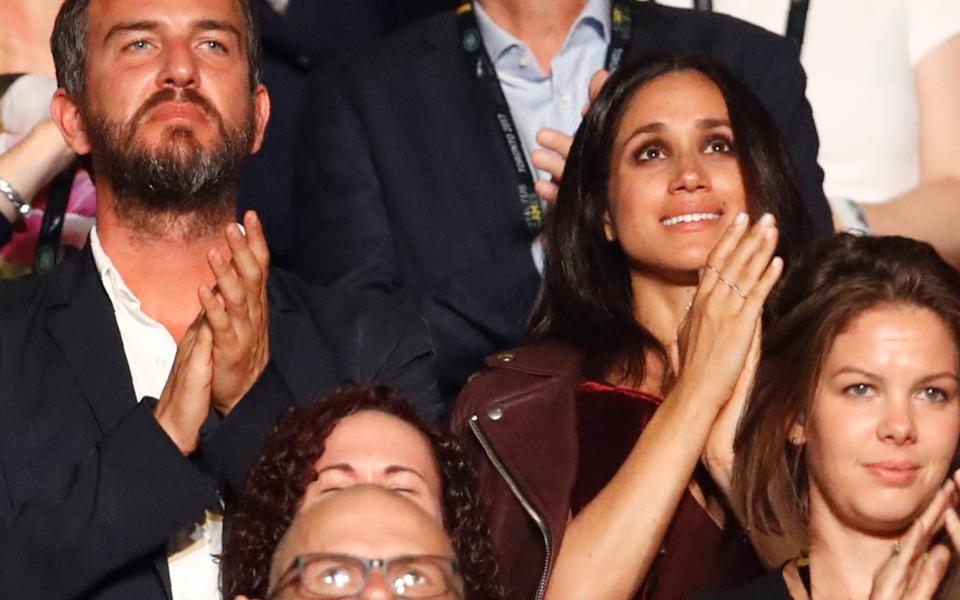 Meghan Markle watches the opening ceremony for the Invictus Games in Toronto - REUTERS