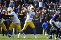 Los Angeles Chargers quarterback Justin Herbert (10) throws the ball during the second quarter of an NFL football game against the Baltimore Ravens, Sunday, Oct. 17, 2021, in Baltimore. (AP Photo/Terrance Williams)