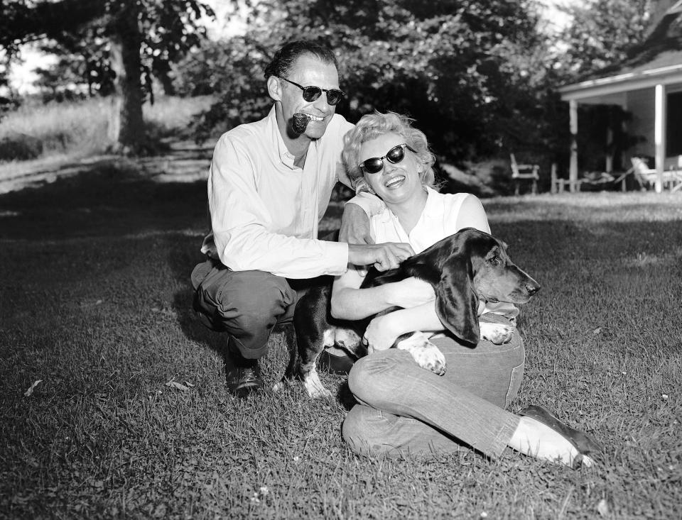 Marilyn Monroe, Arthur Miller and his dog Hugo at Miller's h (Seymour Wally / NY Daily News via Getty Images)