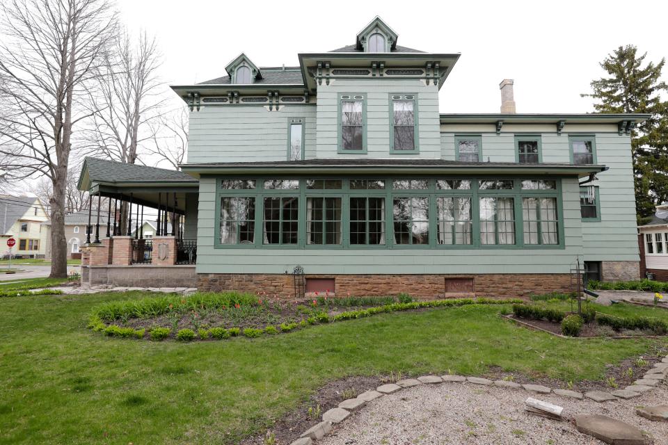 The Doe House on Monday, April 26, 2021, in Oshkosh, Wis. The house was built by William Waters. Becky Brown owns the home with her husband Paul Williams. Brown's great-great-great grandfather William Harvey Doe was the original owner.