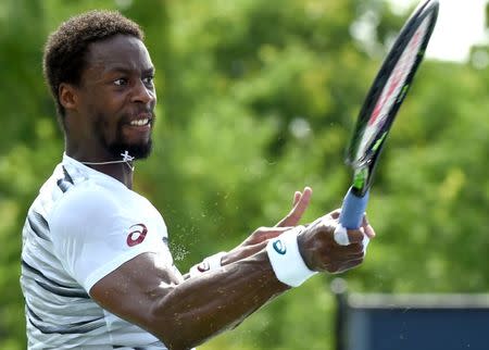 Jul 28, 2016; Toronto, Ontario, Canada; Gael Monfils of France plays a shot against David Goffin of Belgium on day four of the Rogers Cup tennis tournament at Aviva Centre. Monfils won 7-6, 2-6, 6-4. Mandatory Credit: Dan Hamilton-USA TODAY Sports