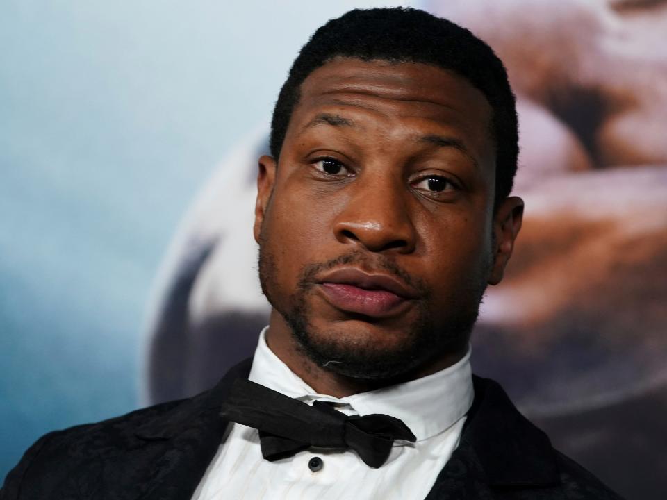 Jonathan Majors arrives at the premiere of "Creed III" on Monday, Feb. 27, 2023, at TCL Chinese Theatre in Los Angeles.