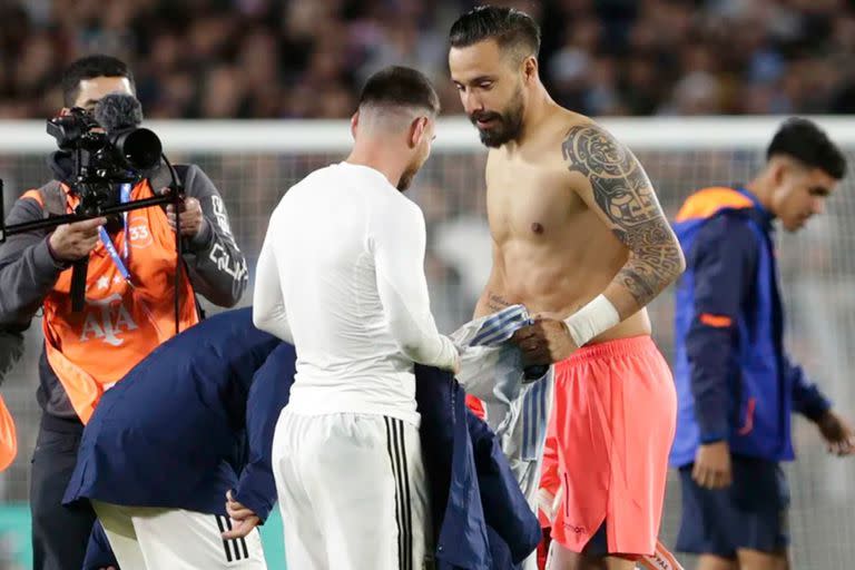 Leo Messi swaps shirts after Argentina's qualifying win over Ecuador