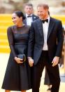 <p>The Duke and Duchess of Sussex laugh as they walk the red carpet of <em>The Lion King</em> premiere in London. </p>