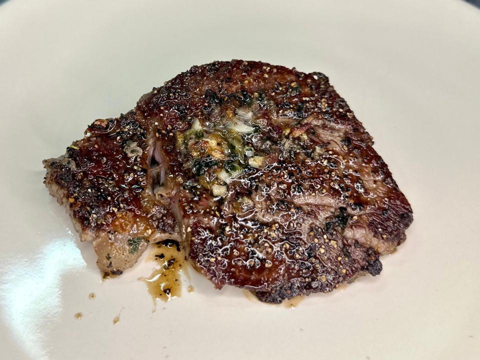 Steak that was made on the stove.