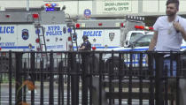 <p>In this image taken from video, emergency personnel converge on Bronx Lebanon Hospital in New York, after a gunman opened fire there on Friday, June 30, 2017. (AP Photo/Joseph Frederick) </p>