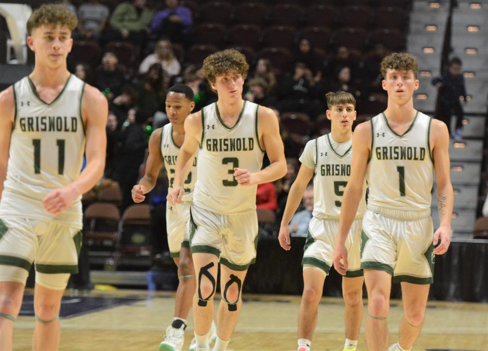 Griswold seniors, from left, Evan Merchant, Jeff Souvenance, Michael Strain, junior KinKade Rubino, and senior Lucas Strain during the ECC D2 tournament final at Mohegan Sun Arena.