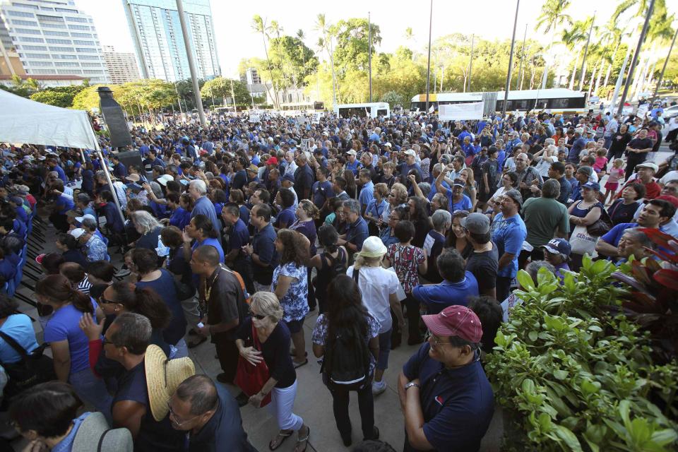 Thousands of people gather at a rally against same sex marriage at the Hawaii State Capital in Honolulu, HI.