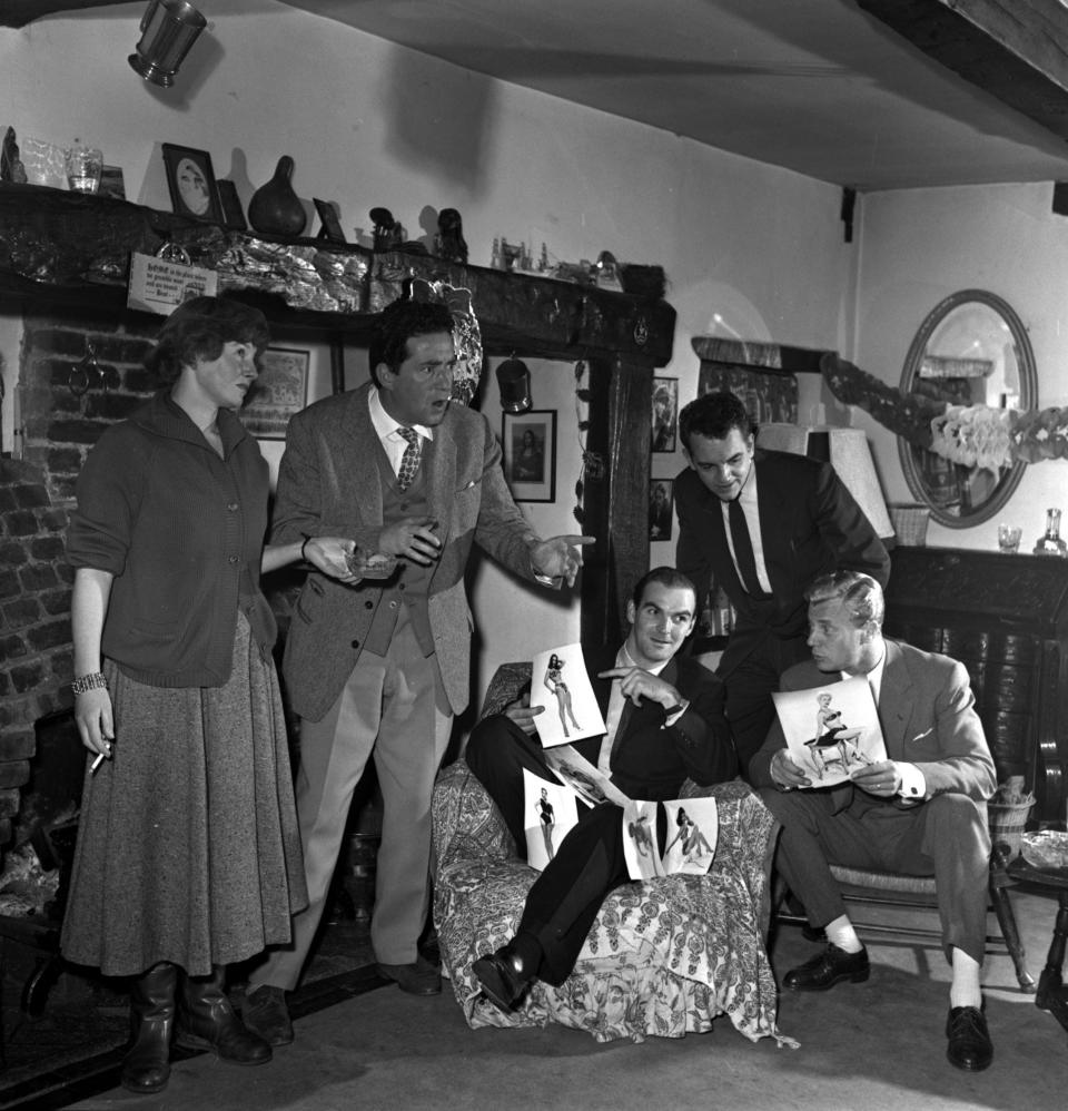 The Gregsons at home in 1957 with, l-r, Stanley Baker, Lyn Fairhurst and Tony Wrigh - Popperfoto via Getty Images