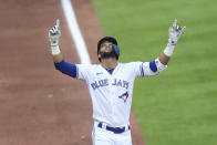 Toronto Blue Jays' Lourdes Gurriel Jr. celebrates after hitting a grand slam home run during the first inning of a baseball game against the Baltimore Orioles in Buffalo, N.Y., Thursday, June 24, 2021. (AP Photo/Joshua Bessex)