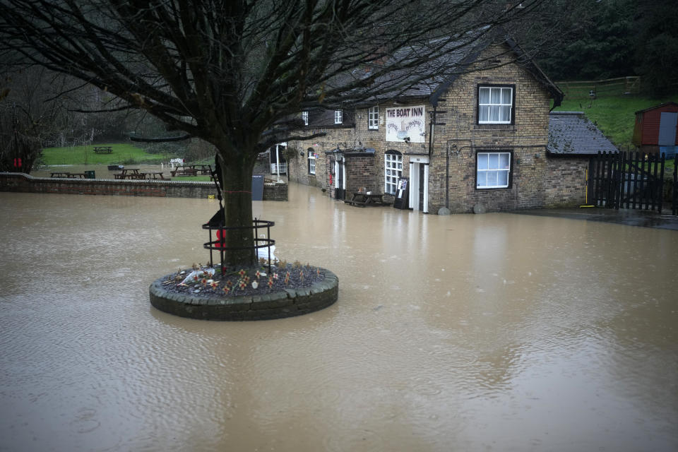 IRONBRIDGE, ENGLAND - JANUARY 02: The Boat Inn pub at Jackfield begins to flood on January 02, 2024 in Ironbridge, England. The Met Office issued warnings for wind and rain in parts of England as Storm Henk arrived. Towns along the River Severn had already experienced flooding following another recent storm. (Photo by Christopher Furlong/Getty Images)