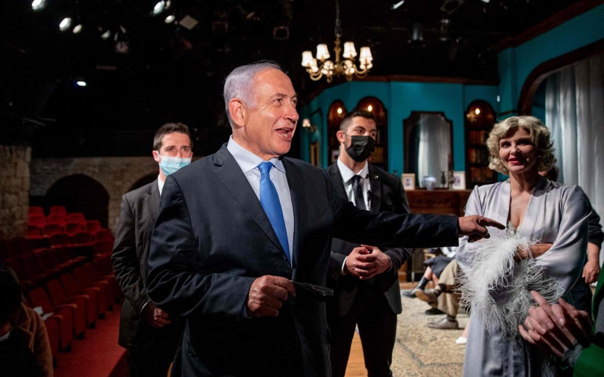 Israeli Prime Minister Benjamin Netanyahu visits a theatre in Jerusalem to mark the re-opening of the culture sector amid a highly successful vaccination programme - OHAD ZWIGENBERG /AFP