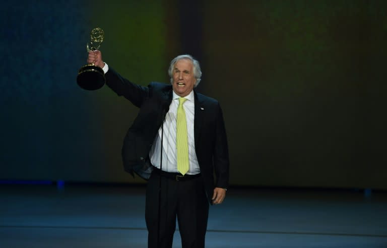 An exultant Henry Winkler held his first Emmys high -- it was more than four decades in the making